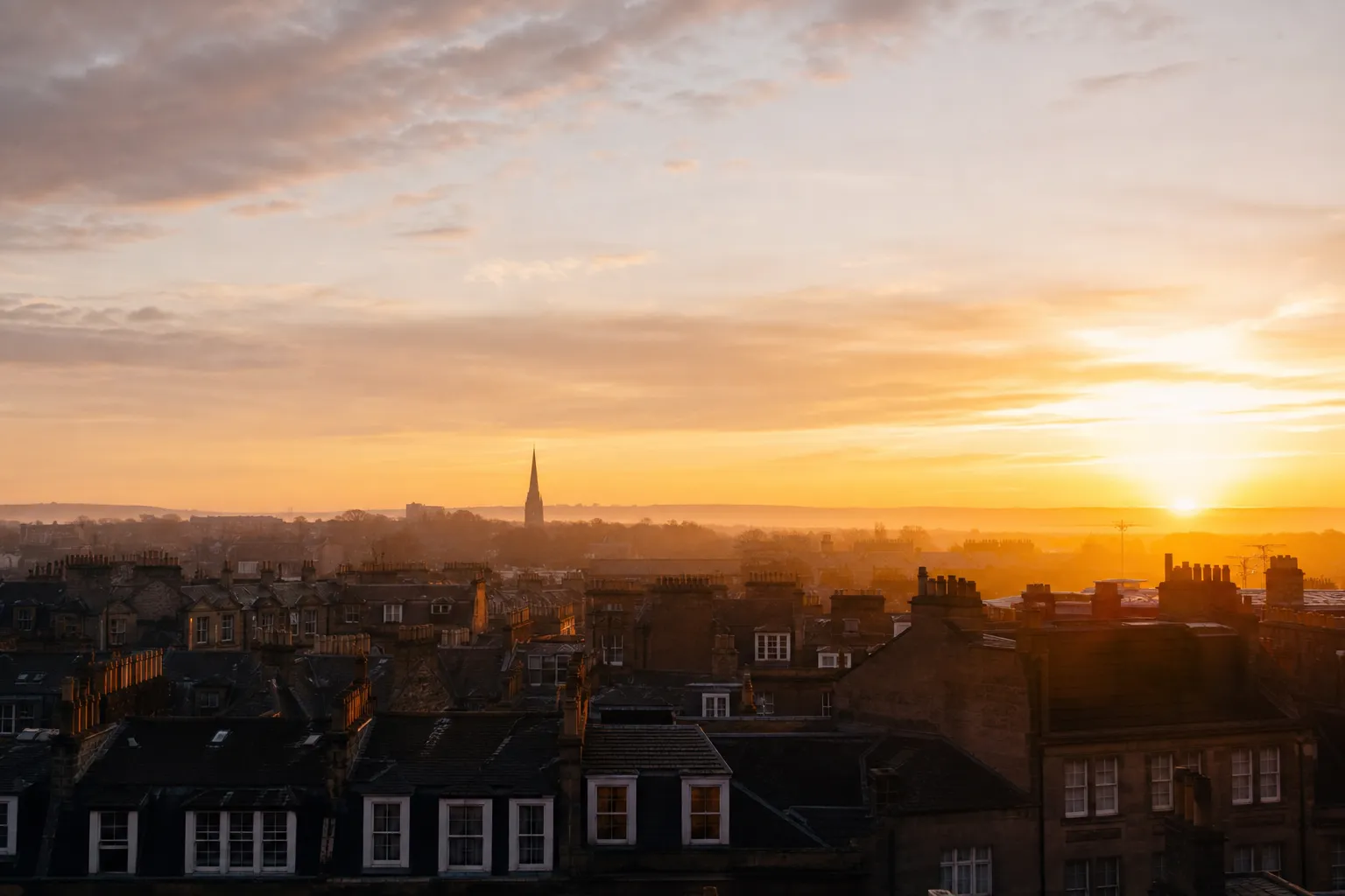 Sunrise over a British city